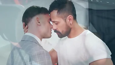 Suited stud Cristian Sam drills Manuel Reyes ass deep in office